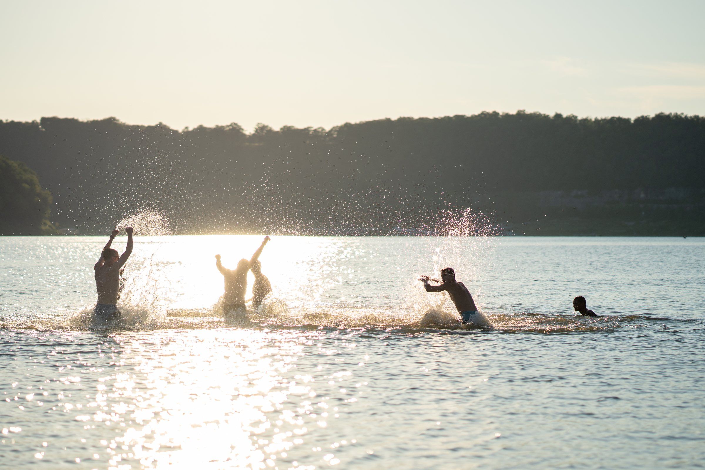 Students splashing in the lake