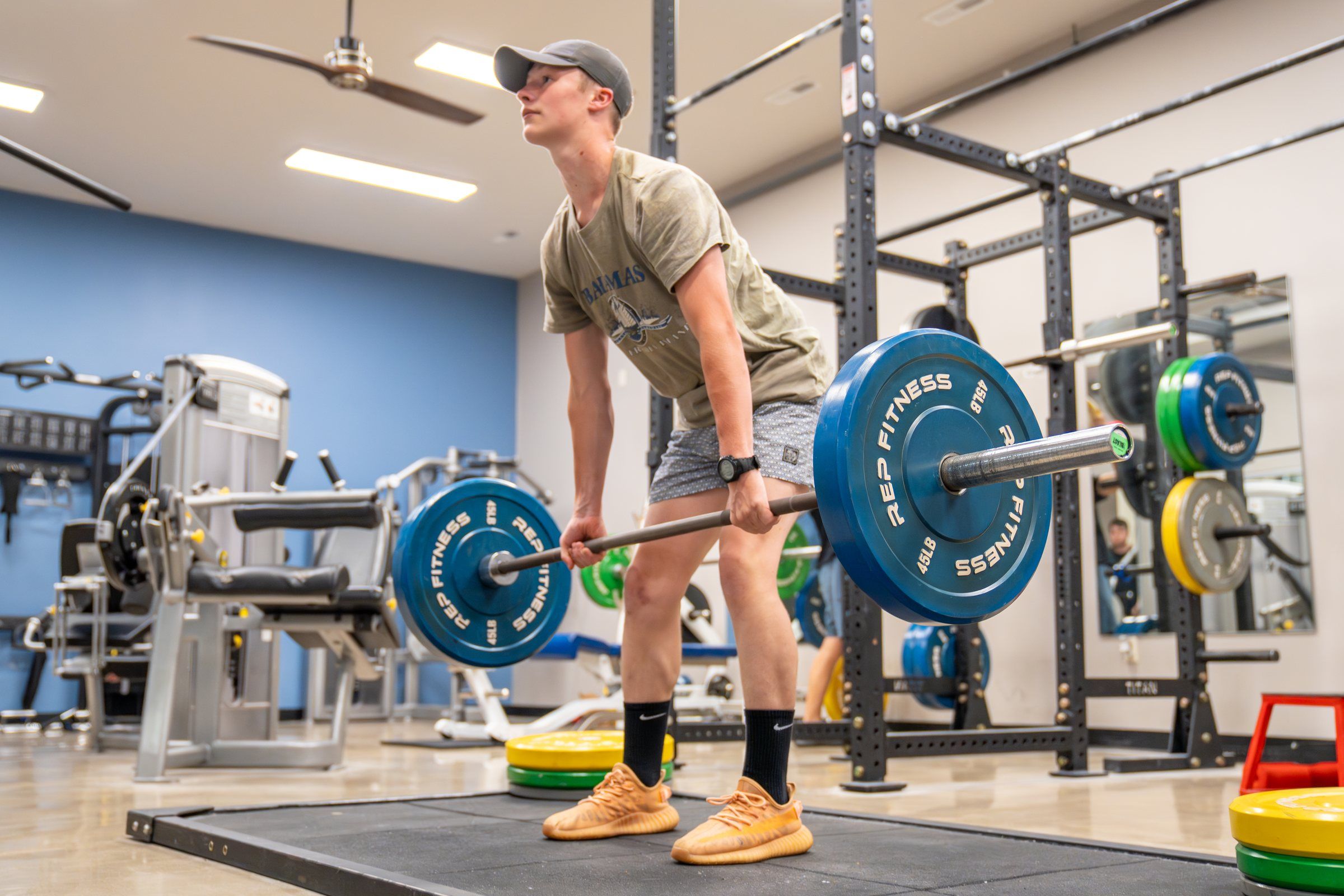 A student deadlifting in the Future Men weight room